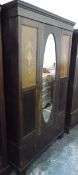 Edwardian mahogany single mirror-door wardrobe with inlaid decoration and long drawer to base,