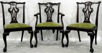 Set of eight mahogany dining chairs with pierced splats and claw and ball feet,
