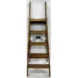 Patented Simplex ladder, the pine five-height ladder with metal mounts,