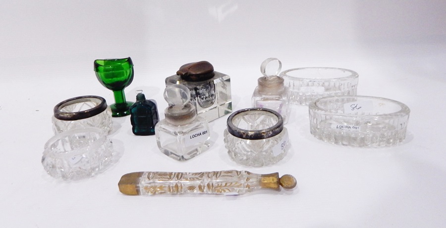 Glass inkwell, glass trinket bowls, eye glass,