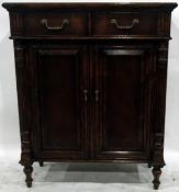 Mahogany cabinet fitted with two short drawers over two panelled cupboard doors,