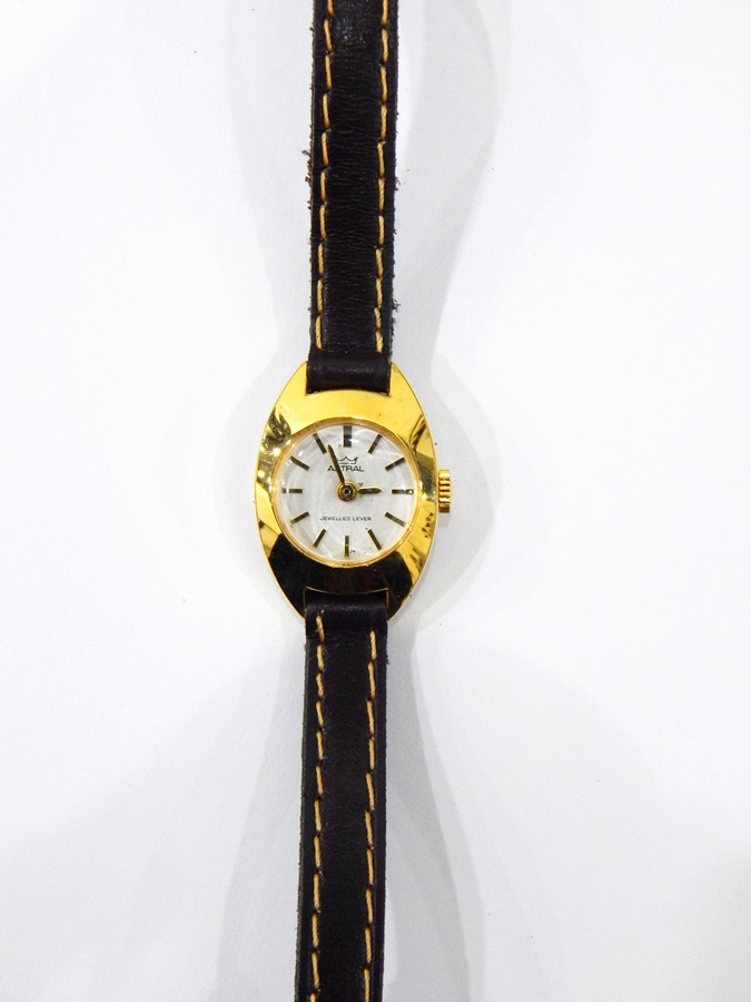Rotary gold-coloured lady's wristwatch in Rotary box with certificate and an Astral wristwatch in