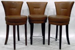 Set of nine swivel bar stools with leatherette upholstery,