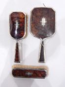 1940's silver and tortoiseshell dressing set comprising mirror and two brushes, London 1940,