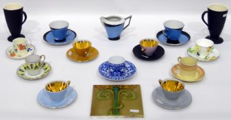 Assorted 20th century coffee cups and saucers to include Burleigh, Noritake, Susie Cooper and Woods,