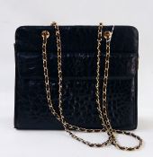 Vintage black crocodile handbag with front pocket, brass-coloured furnishings,