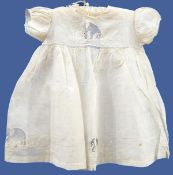 Quantity of baby's embroidered dresses and petticoats including one with embroidered elephants,