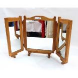 An Arts and Crafts three-fold dressing table mirror,