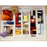 Large collection of perfume sample bottles, boxed and loose, including Hermes, Chanel, Nina Ricci,