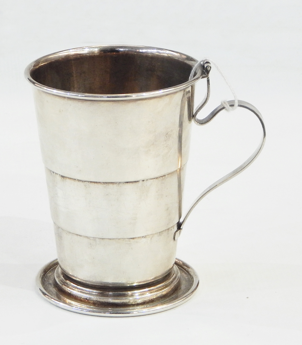 Silver plated collapsible travelling mug with handle, made by Goldsmiths Silversmiths Company,
