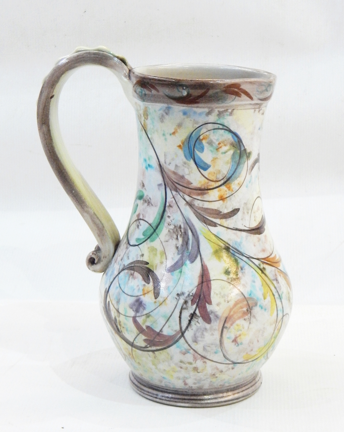 Aldermaston pottery jug with scrolling leaf decoration, marked to base, 22.