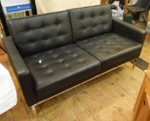 Knoll-style black leather and chrome two-seater settee, square-backed with button upholstery,