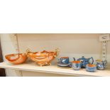 Carltonware tete-a-tete, blue ground with orange lustre to inside,