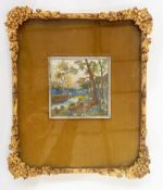 19th century embroidered picture showing trees with water and bluebells,