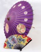 Paper painted parasol and a wood and paper painted fan showing Japanese ladies and flowers (2)