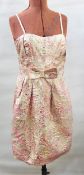 1960's brocade mini dress, spaghetti straps, pleats with bow detail,