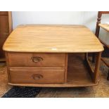 Ercol light elm 'Windsor' range square-shaped coffee table with open shelf, two short drawers,