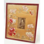 Large red leather gilt tooled photographe frame, with an embroidered and silk applique flowers,