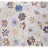 Patchwork quilt, some patches faded and worn, all backed on white ground 208 x 231 cms approx.