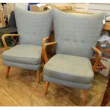 Pair of mid 20th century Scandinavian/Hans Wegner style open armchairs upholstered in contemporary