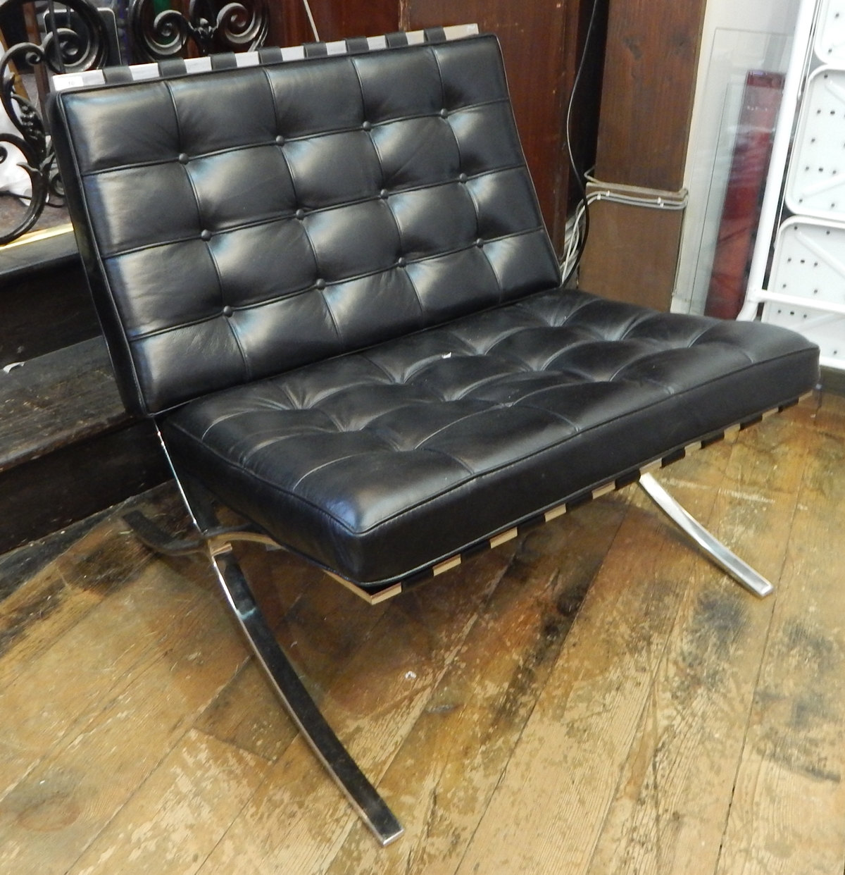 Chrome and black leather Barcelona style chair after Mies van der Rohe (originally designed 1929)