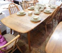 Ercol light elm extending dining table,