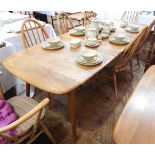 Ercol light elm extending dining table,