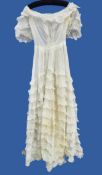 A muslin Edwardian wedding dress,