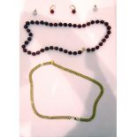 9ct gold flat chain link bracelet, a cornelian beaded necklace,