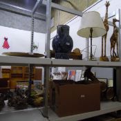 Standard lamp, wooden model giraffes, a pottery jug, a modern barometer, assorted prints,