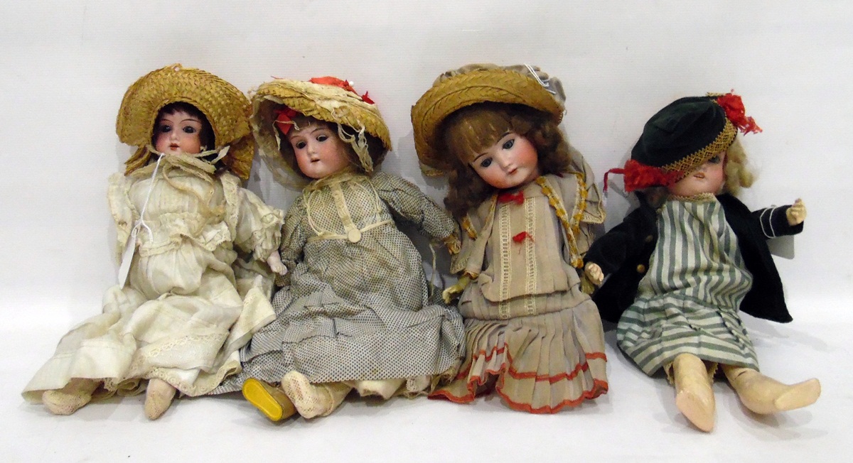 Four bisque headed dolls, three with sleeping eyes and open mouths,