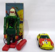 Dux-Astroman electric robot in box and a Schuco model Porsche (2)