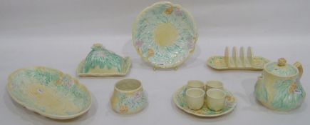 Avonware breakfast set, cream ground with moulded green, mauve and blue floral design,