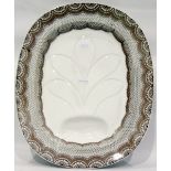 Late 19th century earthenware meat plate, oval, with shaped gullies and well,