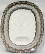 Late 19th century earthenware meat plate, oval, with shaped gullies and well,