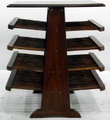 1960's/70's mahogany magazine rack with four shelves,