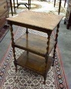 20th century oak three-tier occasional table, rectangular with spirally twist supports,