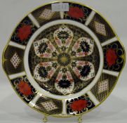 Late 20th century Royal Crown Derby porcelain cigar pattern plate of shaped two-handled form,