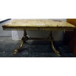 Rectangular marble-topped coffee table on gilt metal base, with serpent head feet,