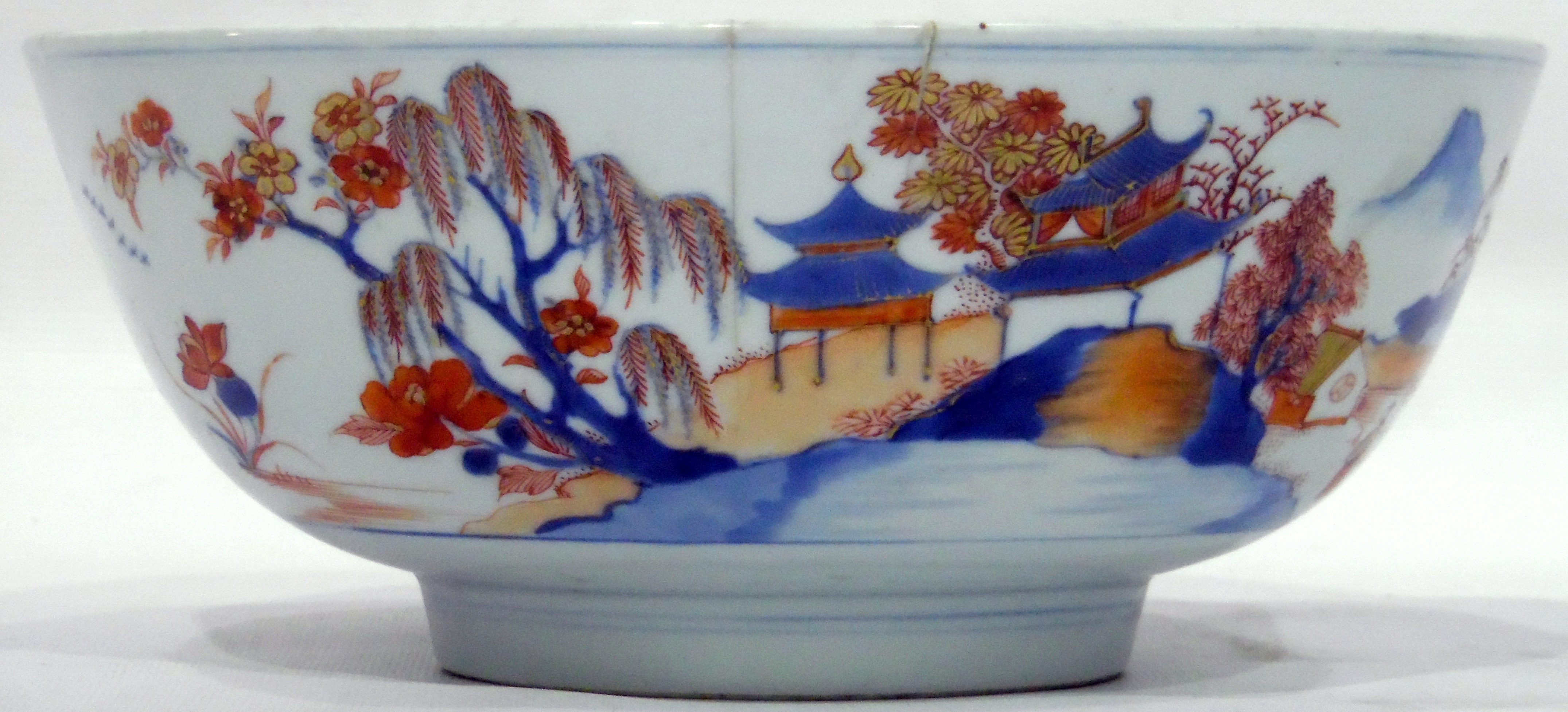 Chinese Imari porcelain bowl painted with figures in rocky landscape with buildings, - Image 2 of 3