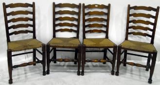 Set of four oak and elm rush-seated ladderback chairs with baluster turned stretchers (4)