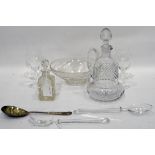 Cut glass wine jug with strawberry cut stopper and body, bulbous base, four small wine glasses,