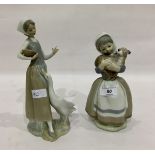 Lladro figure of a girl feeding a goose and a Spanish figure of a girl holding a lamb (2)