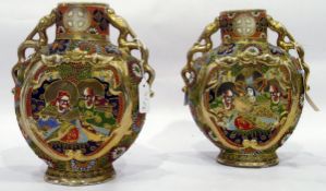 Pair of Japanese Satsuma earthenware disc vases,