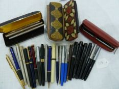 Collection of fountain and ballpoint pens and pencils including Parker, Mont Blanc, Osmiroid,