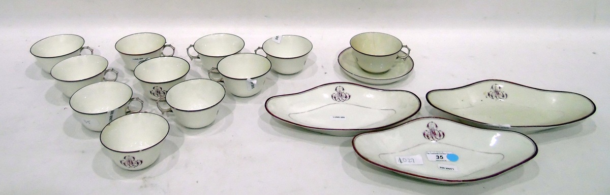 Quantity of monogrammed china to include a set of 11 fine porcelain teacups,