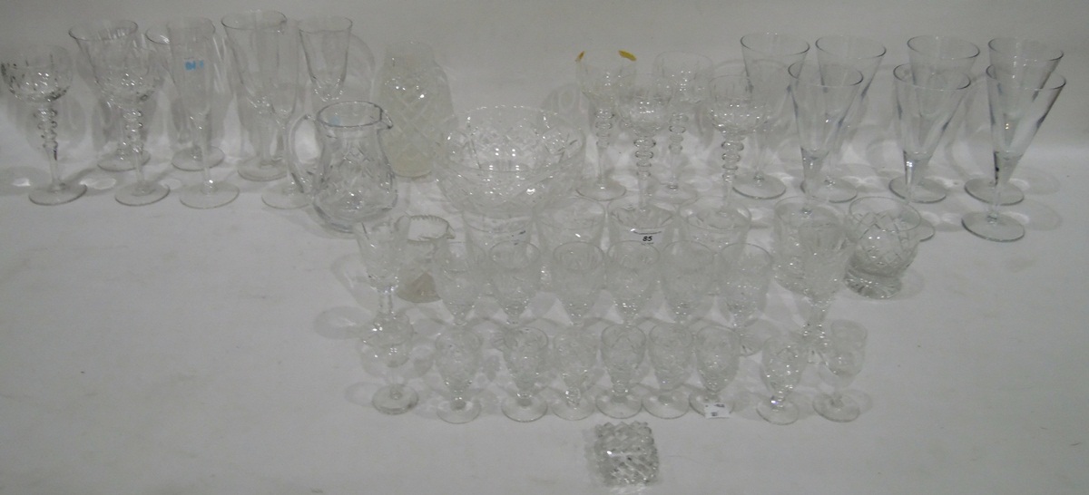 Clear glass set of wine glasses, small glasses, jugs,