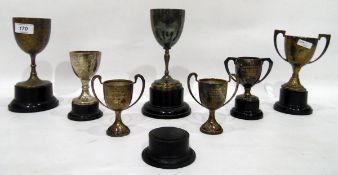 Three silver trophy cups,