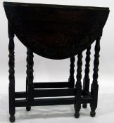 20th century oak drop-flap table, the carved top with turned supports united by stretchers,