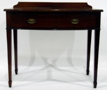 Mahogany bowfront side table fitted a drawer, on square tapering supports and spade feet,